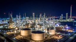 Aerial,View,Oil,And,Gas,Tank,With,Oil,Refinery,Background