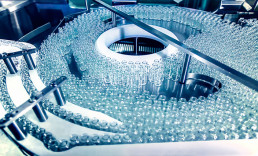 Pharmaceutical glass bottles on conveyor